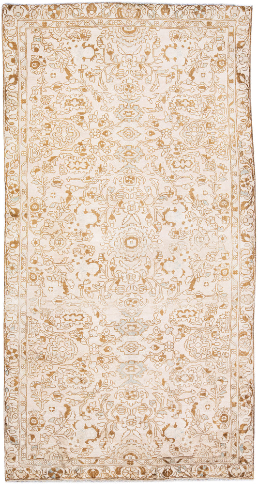 Beautiful beige wool rug with floral designs and interwoven patterns